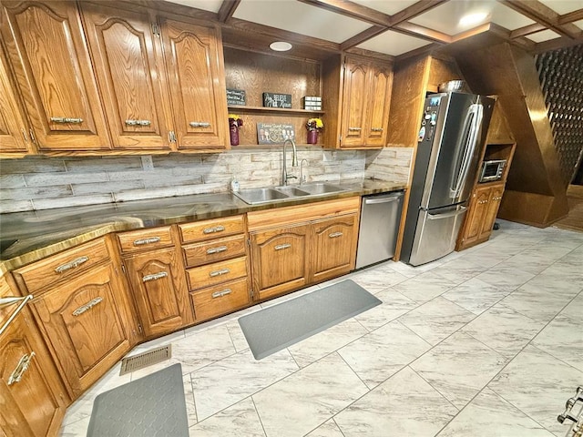 129 Park Dr, Sayre, OK 73662 - kitchen featuring a sink, appliances with stainless steel finishes, brown cabinetry, light marble finish floors, and coffered ceiling