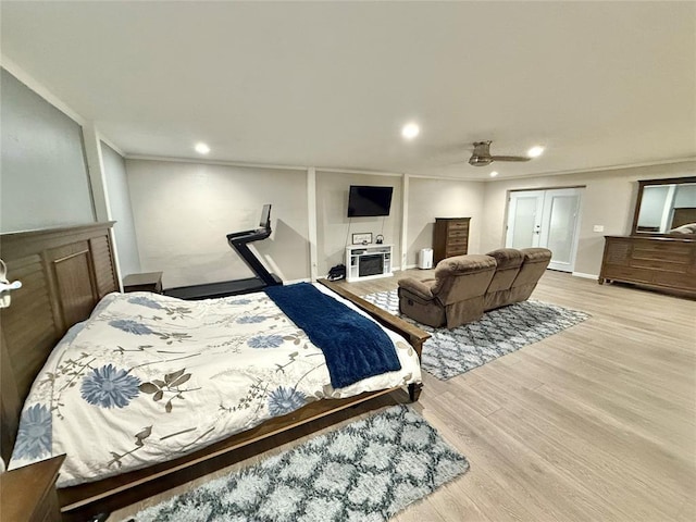 129 Park Dr, Sayre, OK 73662 - bedroom with ornamental molding, wood finished floors, ceiling fan, and recessed lighting