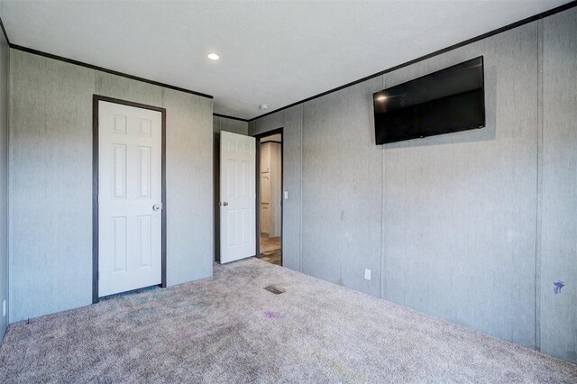 177074 Stephens Rd, Duncan, OK 73533 - unfurnished bedroom featuring carpet, crown molding, and recessed lighting