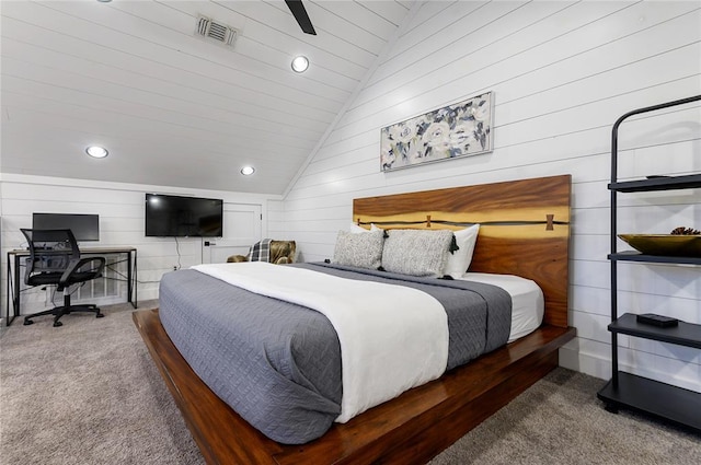 2690 Sweet Home Rd, Broken Bow, OK 74728 - bedroom with carpet floors, lofted ceiling, recessed lighting, and wood walls