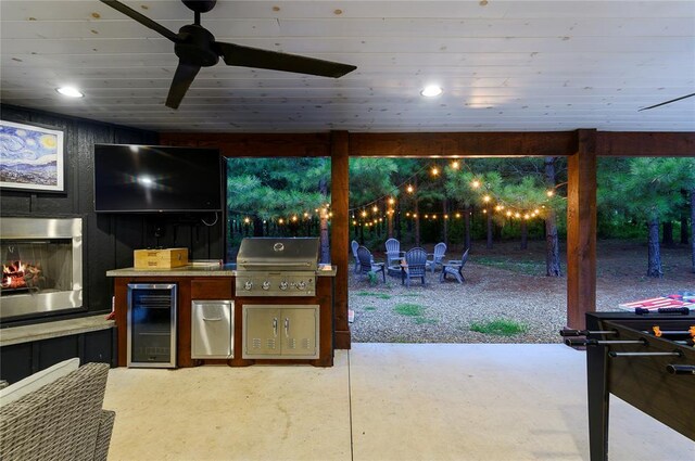 2690 Sweet Home Rd, Broken Bow, OK 74728 - view of patio / terrace featuring wine cooler and a ceiling fan