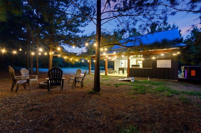 2690 Sweet Home Rd, Broken Bow, OK 74728 - view of yard at dusk