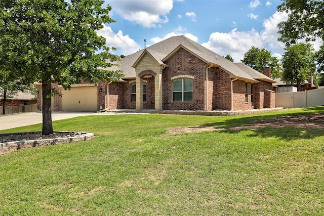 3327 Bobcat Trl, Guthrie, OK 73044 - view of front facade with brick siding, an attached garage, driveway, a shingled roof, and a chimney