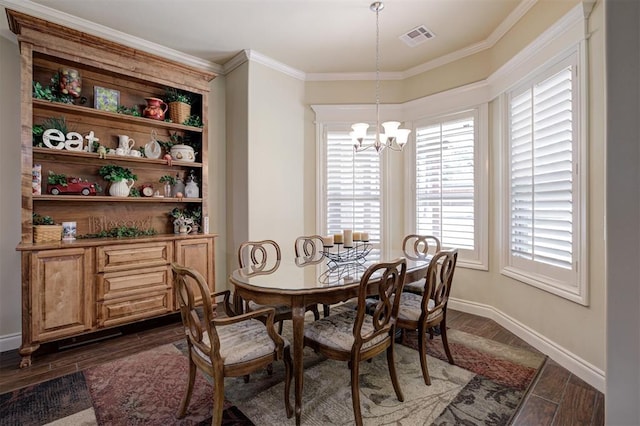 3327 Bobcat Trl, Guthrie, OK 73044 - dining space with dark wood-style floors, a chandelier, and ornamental molding