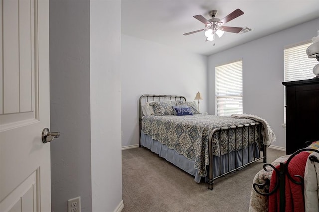 3327 Bobcat Trl, Guthrie, OK 73044 - bedroom with light carpet and a ceiling fan