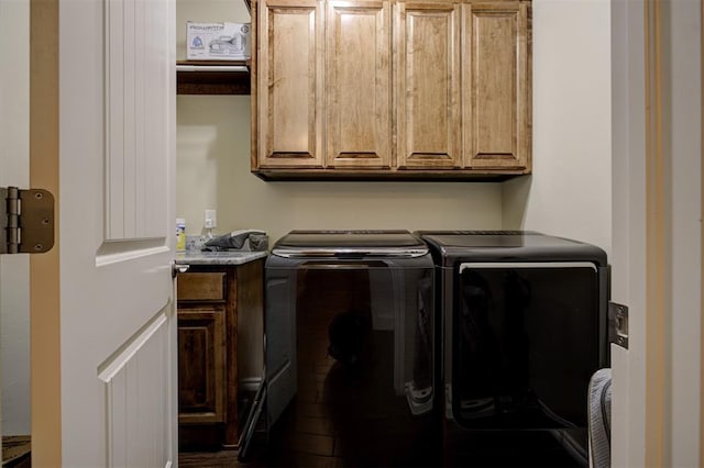 3327 Bobcat Trl, Guthrie, OK 73044 - washroom with washer and clothes dryer, cabinet space, and wood finished floors
