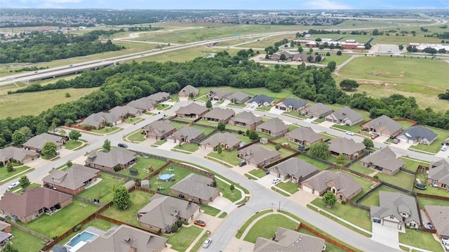 10921 SW 20th St, Yukon, OK 73099 - aerial overview of property's location with nearby suburban area