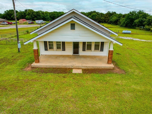 344020 E 760th Rd, Agra, OK 74824 - back of house featuring a porch