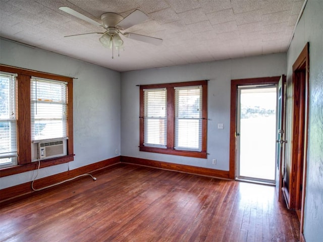344020 E 760th Rd, Agra, OK 74824 - spare room with hardwood / wood-style flooring, cooling unit, plenty of natural light, and ceiling fan