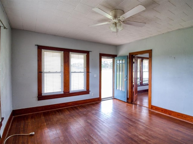 344020 E 760th Rd, Agra, OK 74824 - unfurnished room with baseboards, a ceiling fan, and wood finished floors