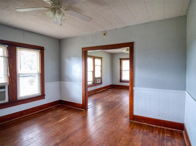 344020 E 760th Rd, Agra, OK 74824 - unfurnished room with baseboards, hardwood / wood-style floors, and ceiling fan