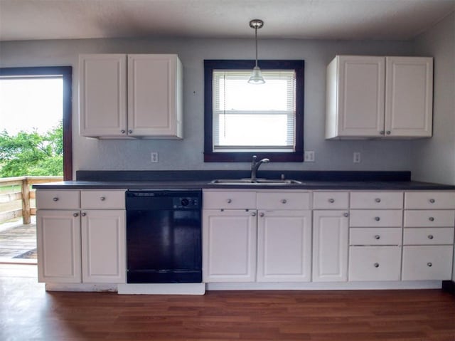 344020 E 760th Rd, Agra, OK 74824 - kitchen with black dishwasher, a sink, dark countertops, and white cabinetry