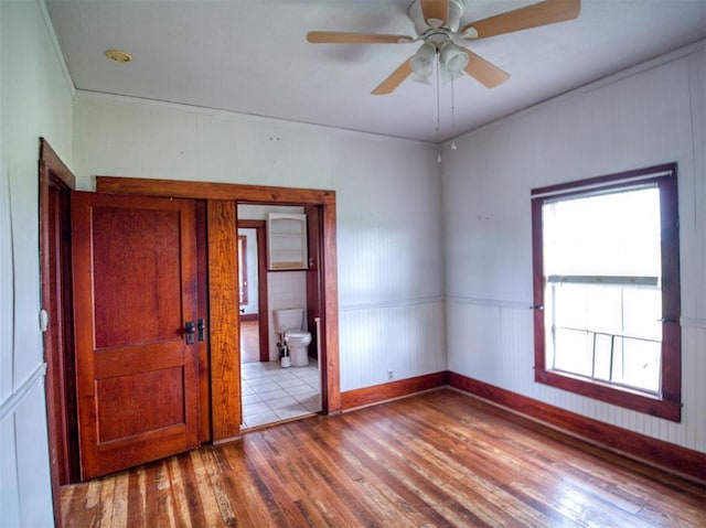 344020 E 760th Rd, Agra, OK 74824 - spare room featuring wood finished floors, ceiling fan, and baseboards