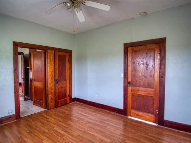 344020 E 760th Rd, Agra, OK 74824 - empty room with light wood-style floors, baseboards, ceiling fan, and a smoke detector