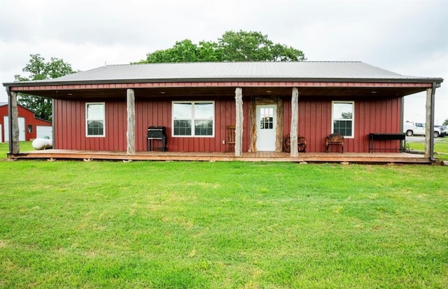 16301 Lewis Rd, Lexington, OK 73051 - view of front of property featuring board and batten siding, a front lawn, and metal roof