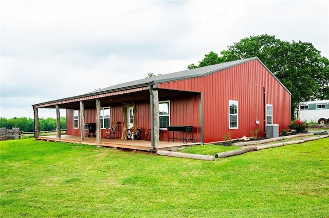 16301 Lewis Rd, Lexington, OK 73051 - rear view of house with central AC and a yard