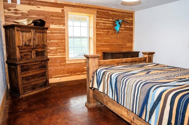 16301 Lewis Rd, Lexington, OK 73051 - bedroom with wood walls and finished concrete floors
