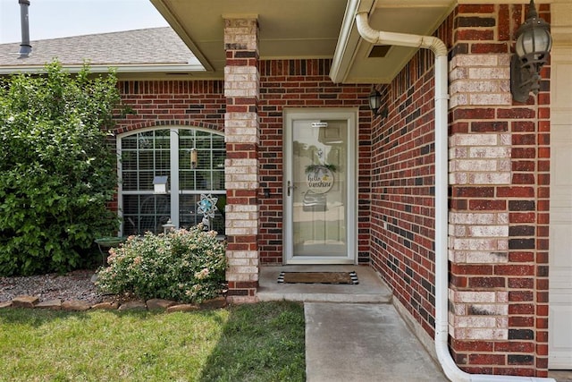 2333 Berry Ln, Midwest City, OK 73130 - entrance to property featuring brick siding and a shingled roof