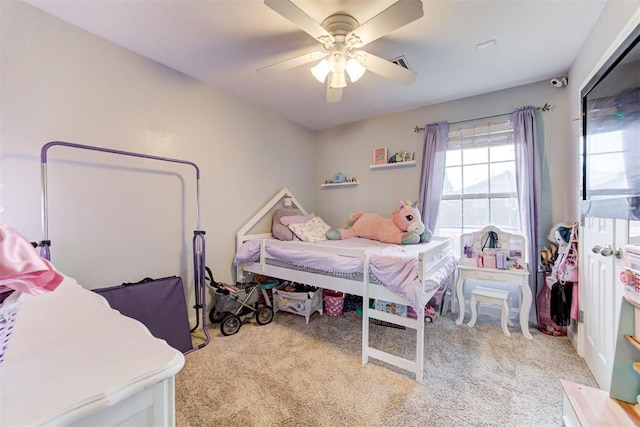 2333 Berry Ln, Midwest City, OK 73130 - carpeted bedroom with a ceiling fan