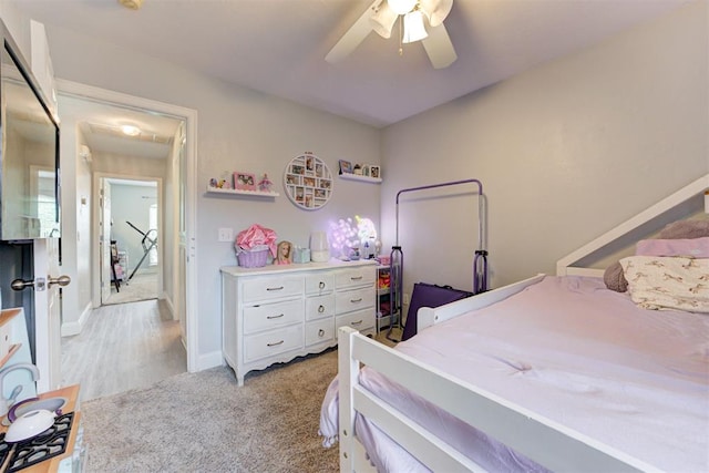 2333 Berry Ln, Midwest City, OK 73130 - bedroom featuring baseboards, ceiling fan, and light colored carpet