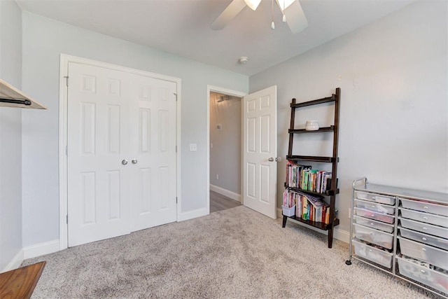 2333 Berry Ln, Midwest City, OK 73130 - bedroom with carpet floors, baseboards, ceiling fan, and a closet