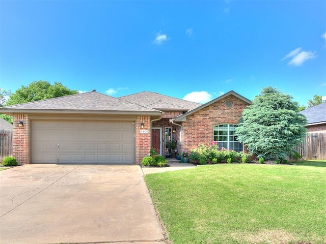 4409 Newport Dr, Norman, OK 73072 - single story home featuring brick siding, an attached garage, concrete driveway, and a shingled roof