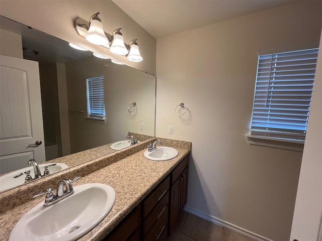 1400 Hillside Ter, Blanchard, OK 73010 - full bath with double vanity, tile patterned floors, and baseboards