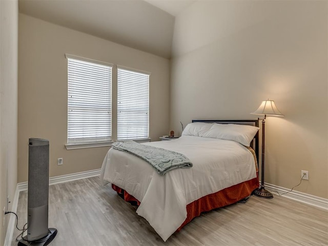 2500 Cordgrass Ln, Edmond, OK 73013 - bedroom with light wood finished floors and baseboards