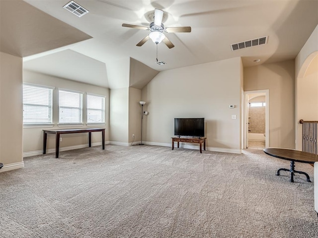2500 Cordgrass Ln, Edmond, OK 73013 - sitting room with ceiling fan, carpet, vaulted ceiling, and baseboards