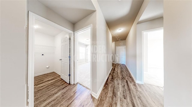 11817 NW 97th St, Yukon, OK 73099 - corridor featuring wood finished floors and baseboards