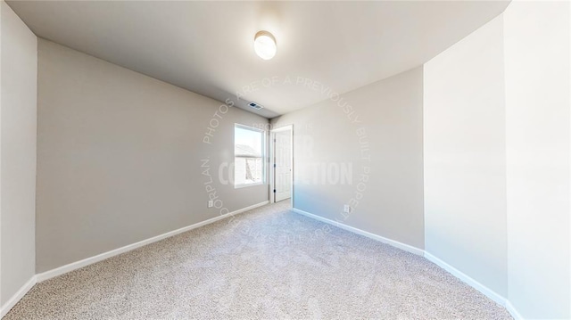 11817 NW 97th St, Yukon, OK 73099 - spare room featuring carpet and baseboards