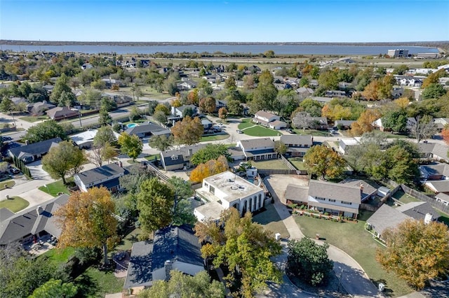 11000 Magnolia Park, Oklahoma City, OK 73120 - aerial view of property and surrounding area featuring a nearby body of water and nearby suburban area