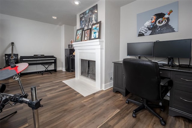 11000 Magnolia Park, Oklahoma City, OK 73120 - home office with a fireplace with flush hearth, wood finished floors, baseboards, and recessed lighting