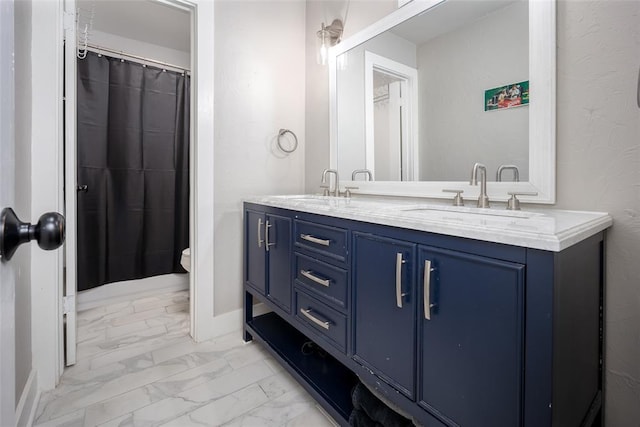 11000 Magnolia Park, Oklahoma City, OK 73120 - bathroom featuring marble finish floors, toilet, double vanity, and baseboards