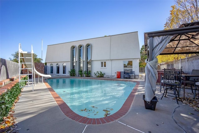 11000 Magnolia Park, Oklahoma City, OK 73120 - view of swimming pool with a water slide, a patio area, and a gazebo