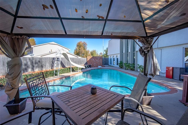 11000 Magnolia Park, Oklahoma City, OK 73120 - view of pool with a water slide, a fenced backyard, a patio, and a gazebo