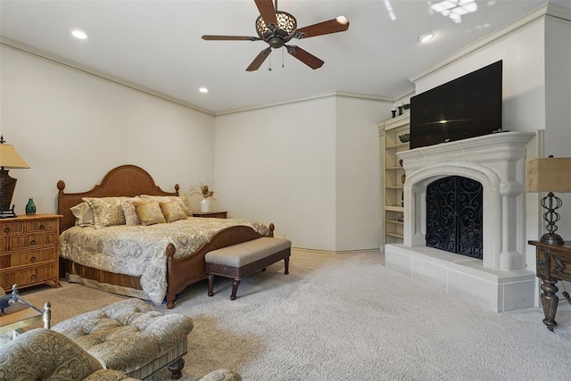 15005 Dourdan Ct, Oklahoma City, OK 73142 - bedroom featuring carpet, a fireplace with raised hearth, crown molding, recessed lighting, and a ceiling fan