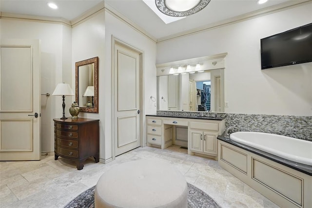 15005 Dourdan Ct, Oklahoma City, OK 73142 - bathroom with vanity, a garden tub, crown molding, and recessed lighting