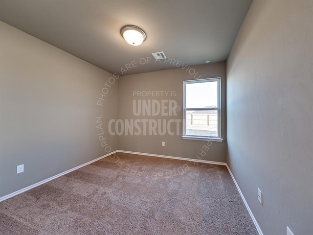 3909 S Ravine St, Stillwater, OK 74074 - spare room featuring carpet floors and baseboards