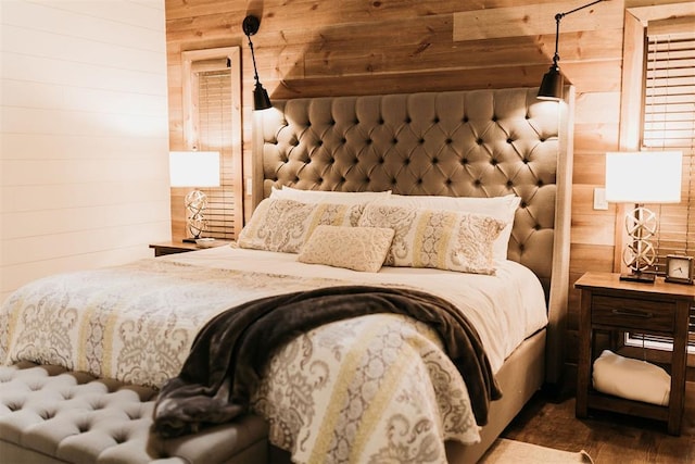 192 Grape Trl, Broken Bow, OK 74728 - bedroom with wood walls and dark wood finished floors
