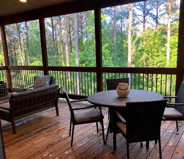 192 Grape Trl, Broken Bow, OK 74728 - wooden deck with outdoor dining space