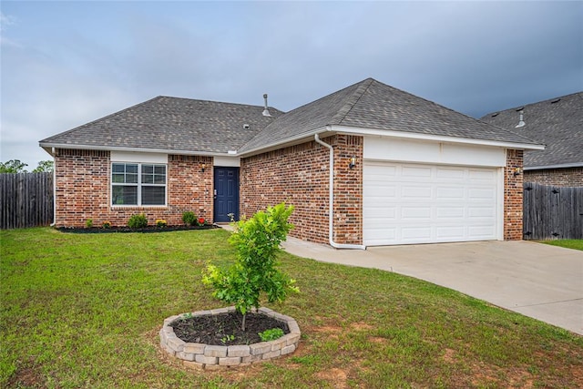 14201 Athens Ln, Yukon, OK 73099 - view of front of house with roof with shingles, driveway, an attached garage, and brick siding