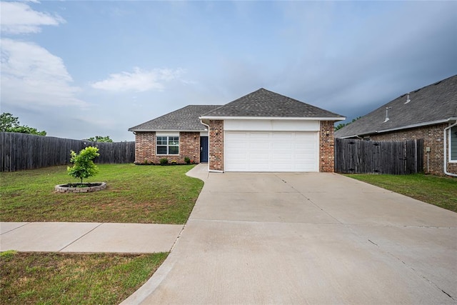 14201 Athens Ln, Yukon, OK 73099 - ranch-style house with an attached garage, driveway, roof with shingles, and brick siding