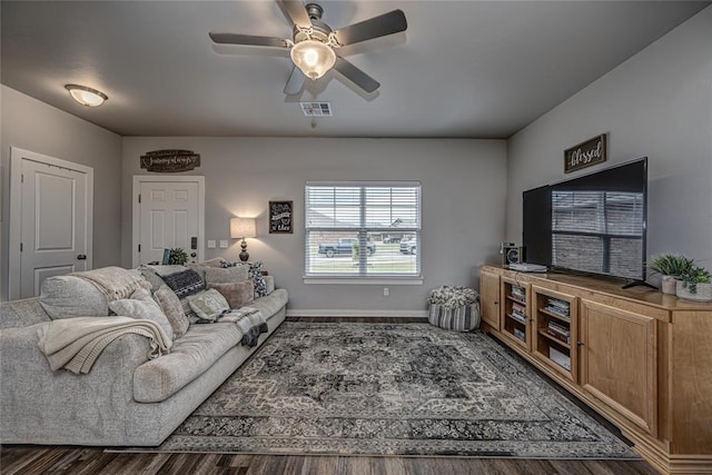 14201 Athens Ln, Yukon, OK 73099 - living area with wood finished floors, baseboards, and a ceiling fan