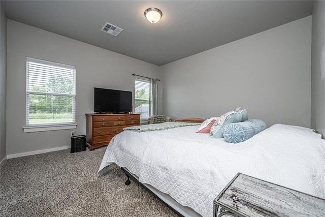14201 Athens Ln, Yukon, OK 73099 - bedroom with carpet flooring and baseboards