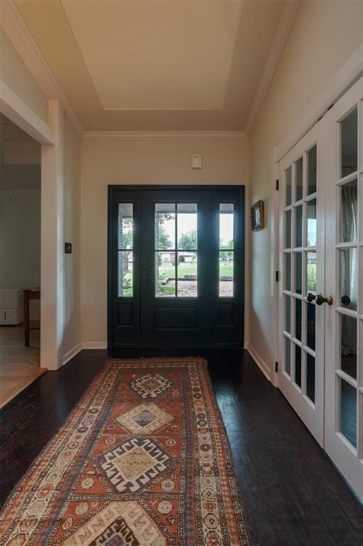 300 E Federal St, Shawnee, OK 74804 - entrance foyer with wood finished floors, ornamental molding, baseboards, a raised ceiling, and french doors