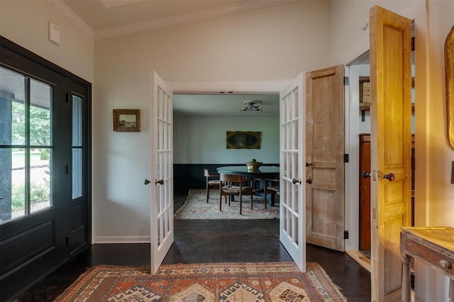 300 E Federal St, Shawnee, OK 74804 - entryway with french doors, plenty of natural light, crown molding, baseboards, and dark wood-type flooring