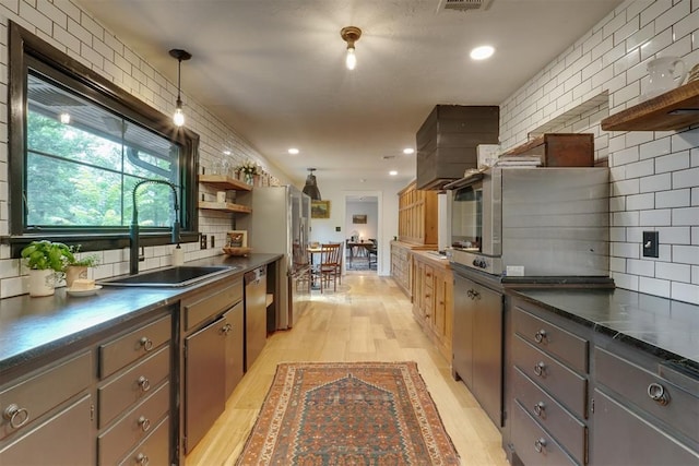 300 E Federal St, Shawnee, OK 74804 - kitchen featuring open shelves, a sink, dark countertops, stainless steel appliances, and recessed lighting