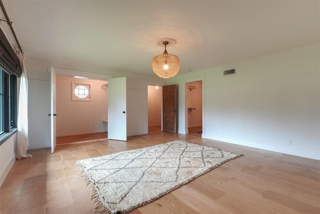 300 E Federal St, Shawnee, OK 74804 - unfurnished room with light wood-style floors and baseboards