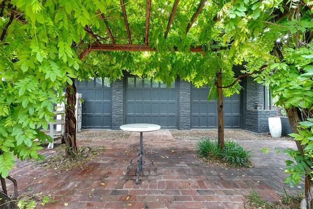 300 E Federal St, Shawnee, OK 74804 - view of patio with a detached garage